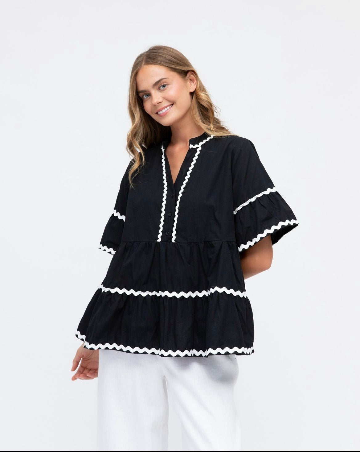 Black Top with white ric rac embroidery